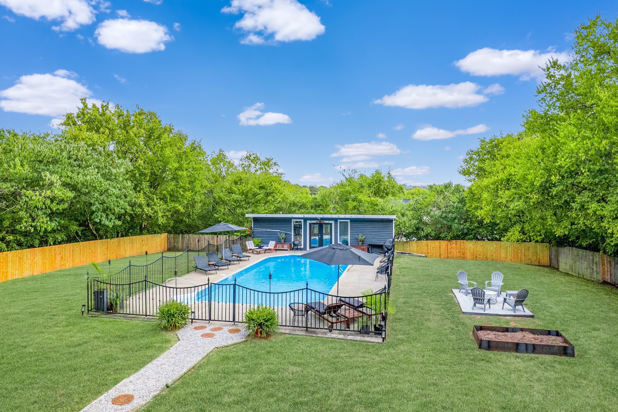 562 B Neelys Bend Road Madison, TN 37115 - Photo 25 of 29 a view of a house with backyard outdoor seating area and furniture