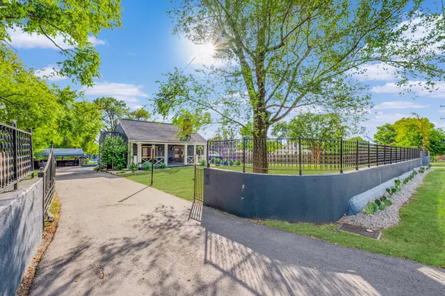 a view of swimming pool with a patio