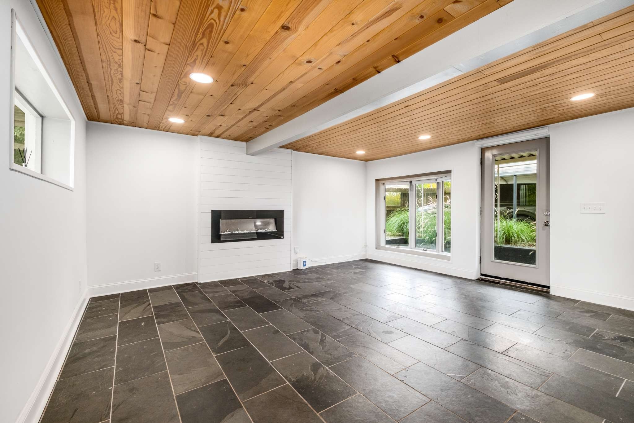 562 B Neelys Bend Road Madison, TN 37115 - Photo 6 of 29 a view of an empty room with a window