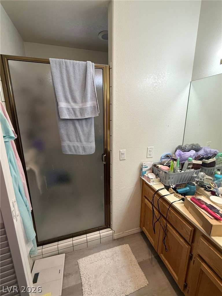 2171 South Blagg Road Pahrump, NV 89048 - Photo 12 of 27 Primary bathroom with 2 sinks and shower