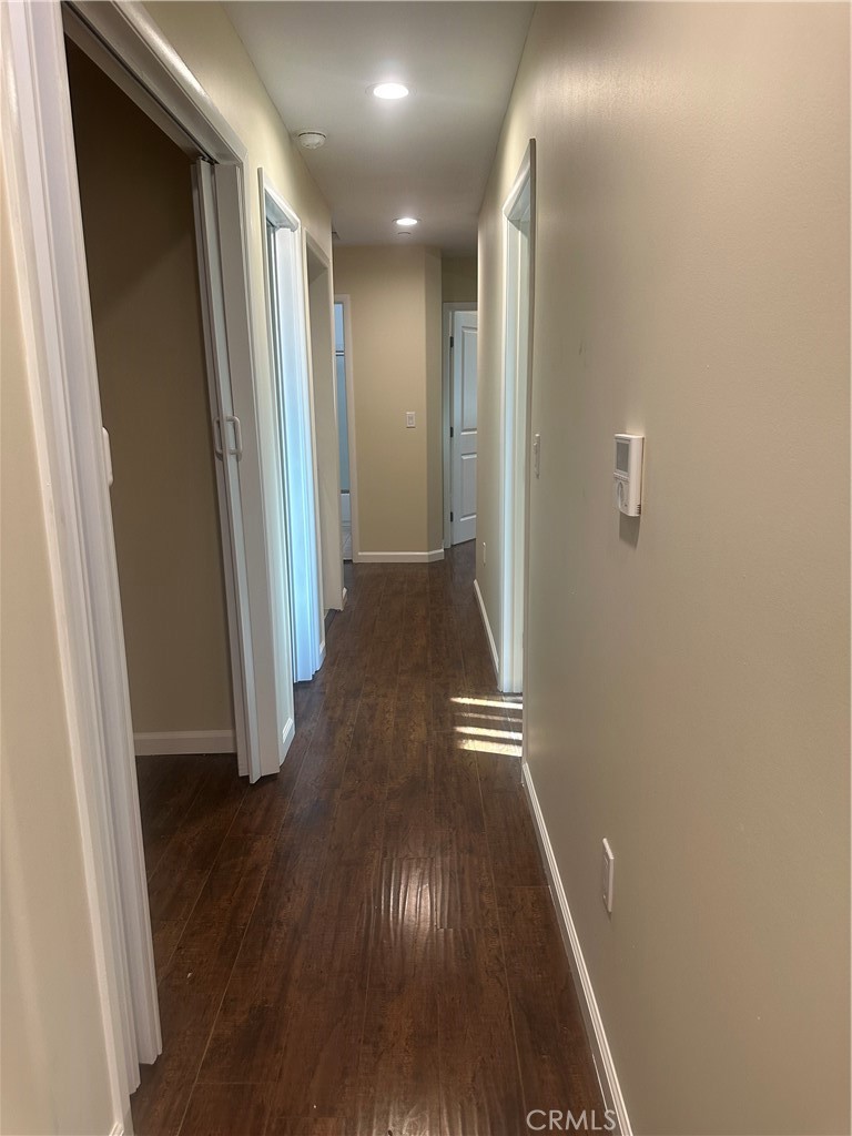 14233 Tiara Street, Unit 3 Sherman Oaks, CA 91401 - Photo 17 of 20 a view of hallway with wooden floor