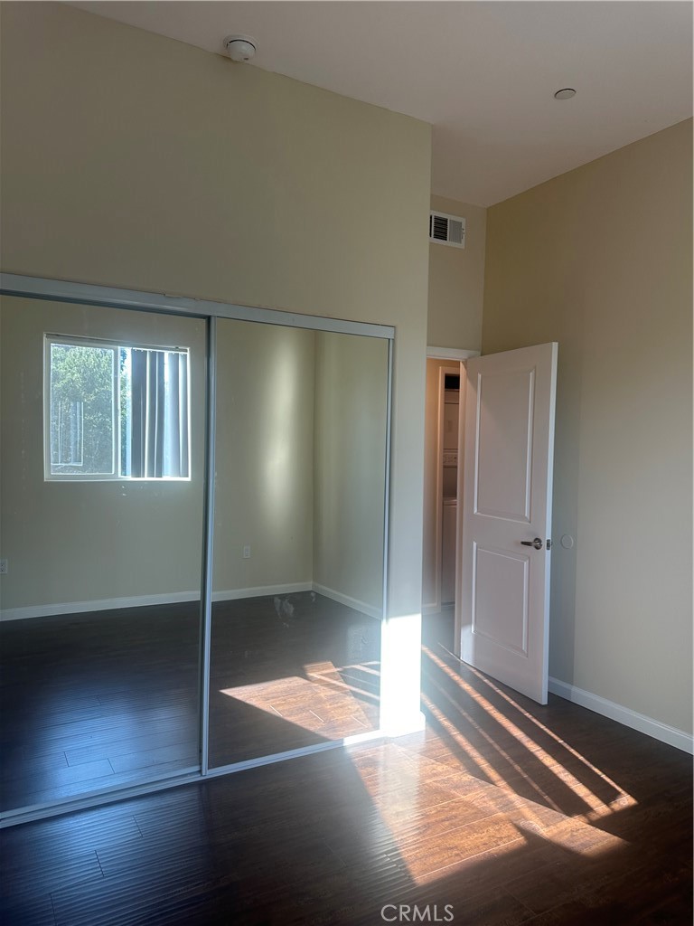 14233 Tiara Street, Unit 3 Sherman Oaks, CA 91401 - Photo 18 of 20 an empty room with windows