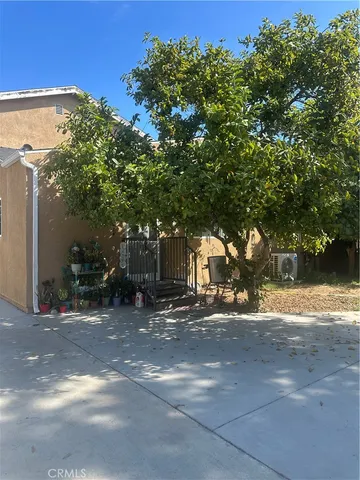 a view of a street with a building in the background