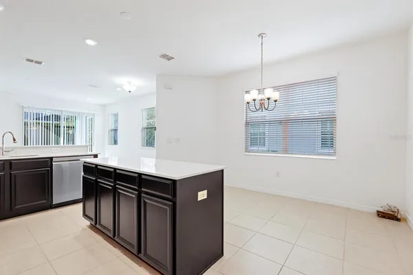 a view of an empty room with glass door
