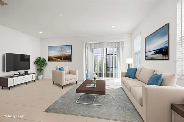 a view of an empty room with glass door