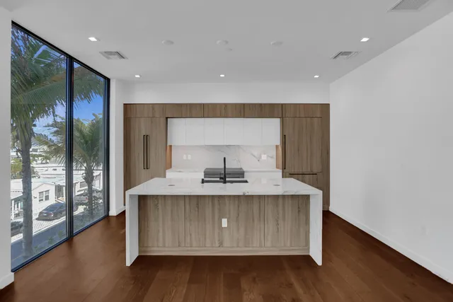 a bathroom with a toilet and a mirror