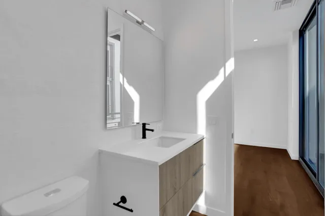 a view of entryway with wooden floor and stairs