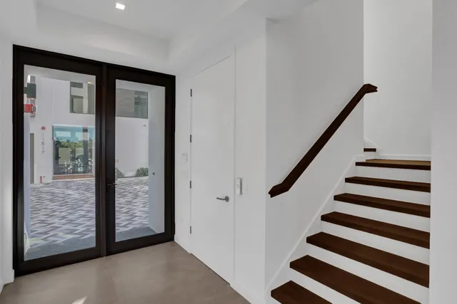 a view of entryway with stairs