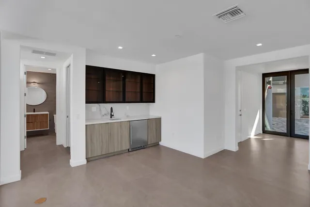 a view of room with window and furniture