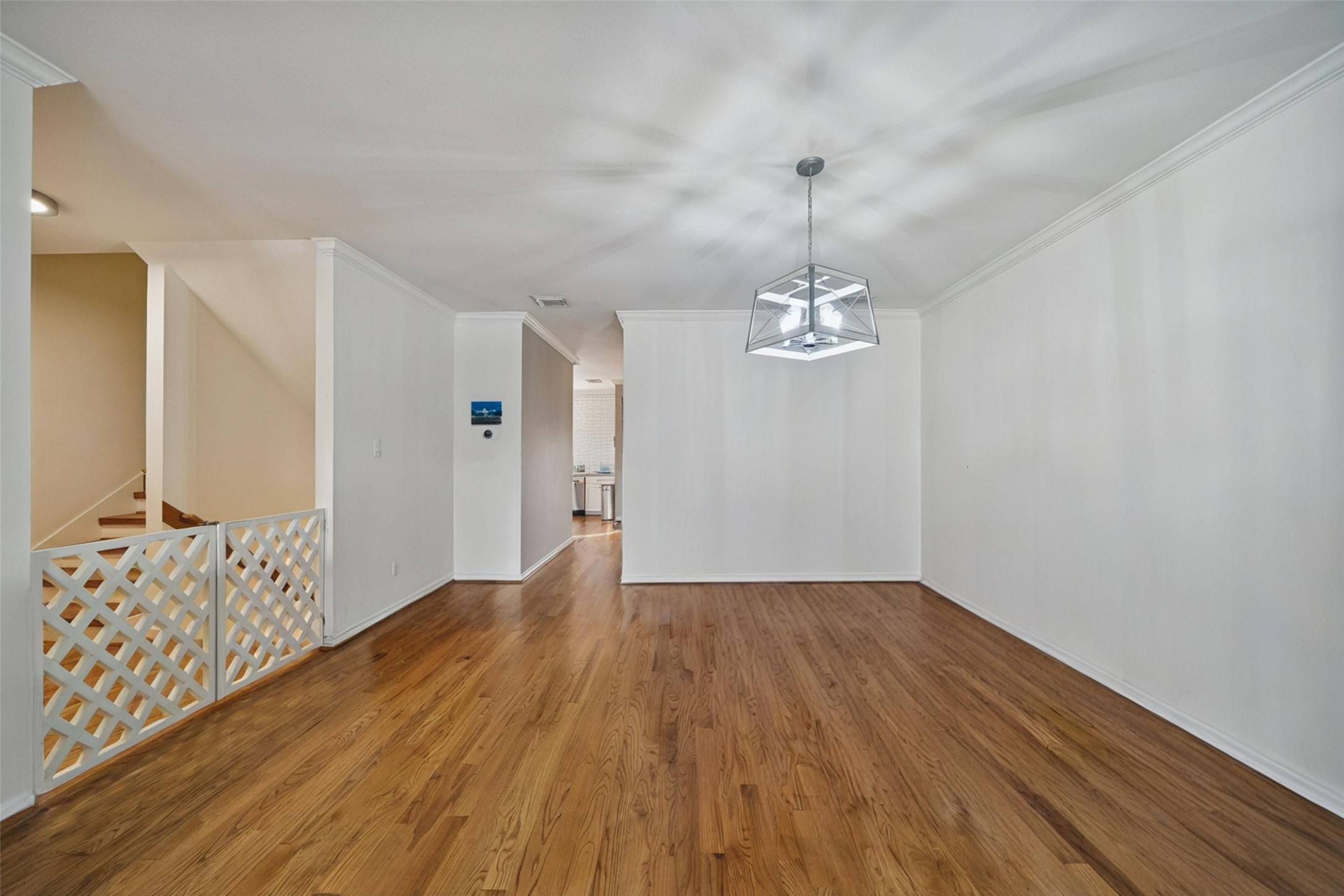 5531 Cornish Street Houston, TX 77007 - Photo 11 of 32 a view of empty room with wooden floor
