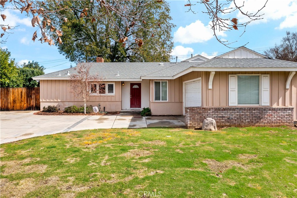 3019 Westridge Road Riverside, CA 92506 - Photo 1 of 1 a front view of a house with a yard and garage
