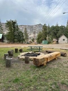 52358 Elder Road, Unit 52 Big Creek, CA 93605 - Photo 27 of 38 a view of swimming pool with outdoor seating and green space