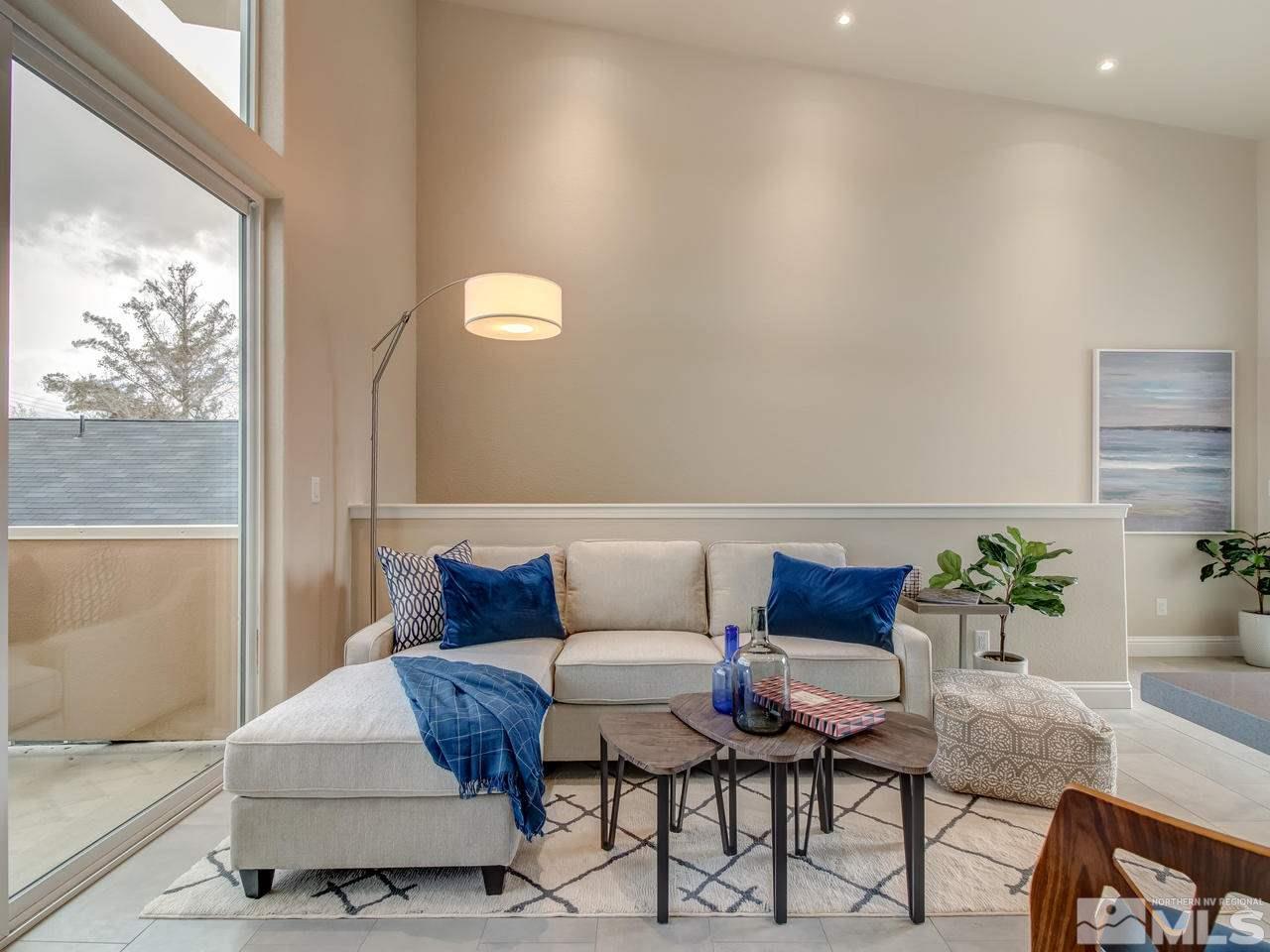 68 Caliente Street Reno, NV 89509 - Photo 5 of 23 a living room with furniture and a potted plant