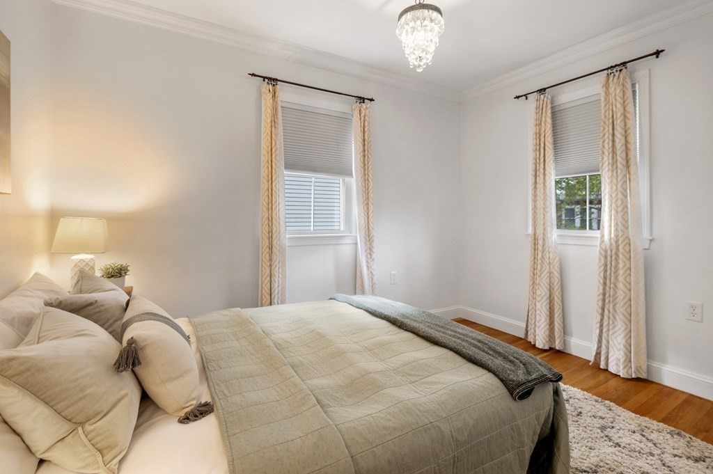 2 Reed St Court, Unit 2 Cambridge, MA 02140 - Photo 11 of 31 a bedroom with a bed and a window