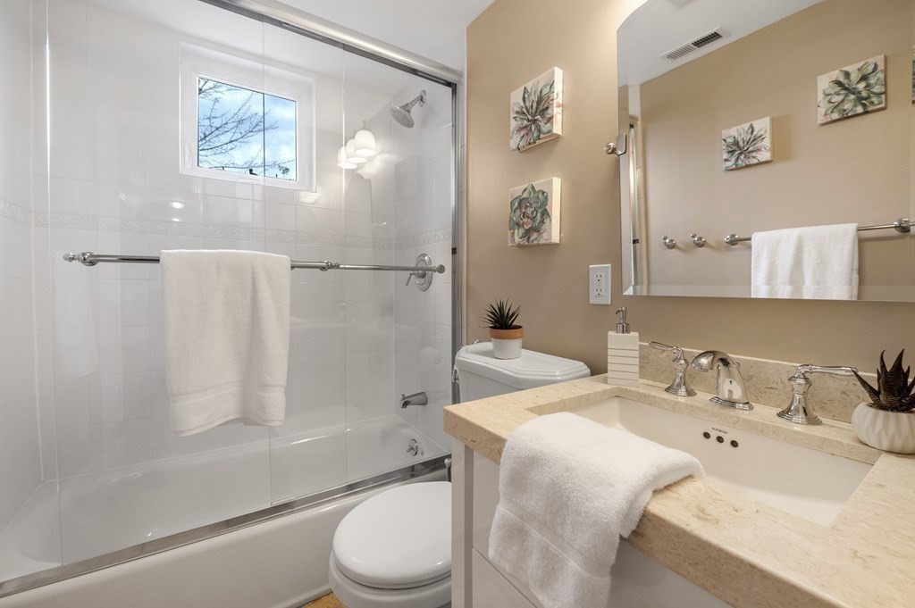 2 Reed St Court, Unit 2 Cambridge, MA 02140 - Photo 12 of 31 a bathroom with a sink a toilet and shower