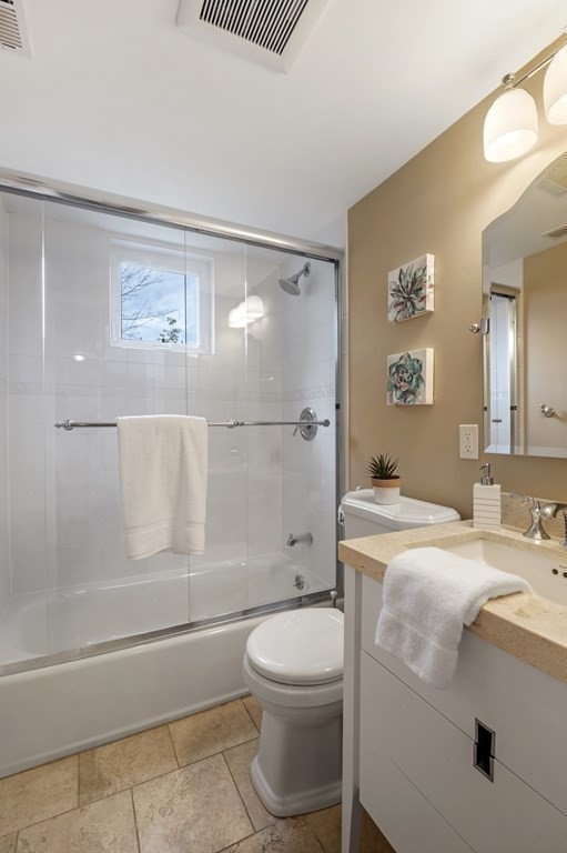 2 Reed St Court, Unit 2 Cambridge, MA 02140 - Photo 13 of 31 a bathroom with a sink a toilet and shower