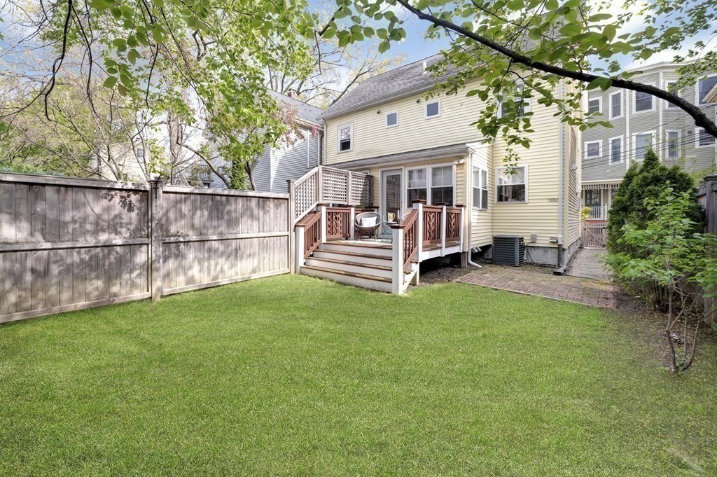 2 Reed St Court, Unit 2 Cambridge, MA 02140 - Photo 26 of 31 a view of a house with backyard and a garden