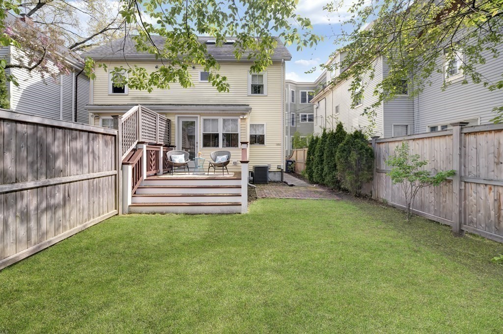2 Reed St Court, Unit 2 Cambridge, MA 02140 - Photo 27 of 31 a front view of a house with a yard