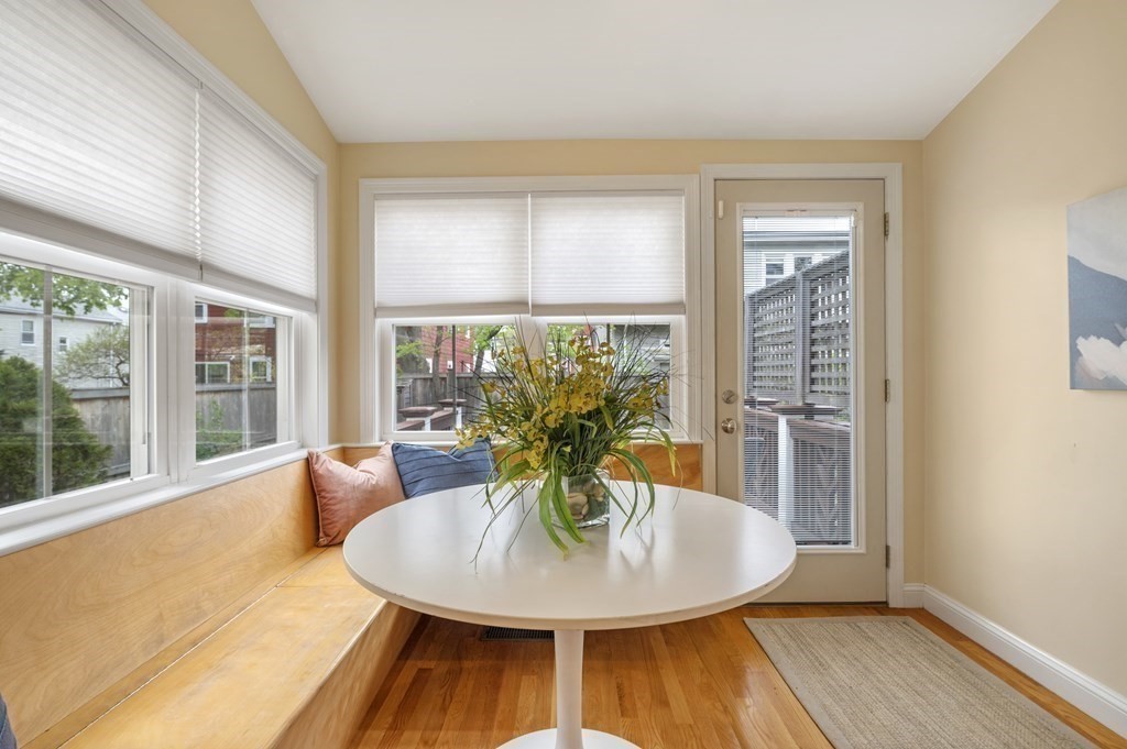 2 Reed St Court, Unit 2 Cambridge, MA 02140 - Photo 8 of 31 a view of a dining room with furniture window and wooden floor