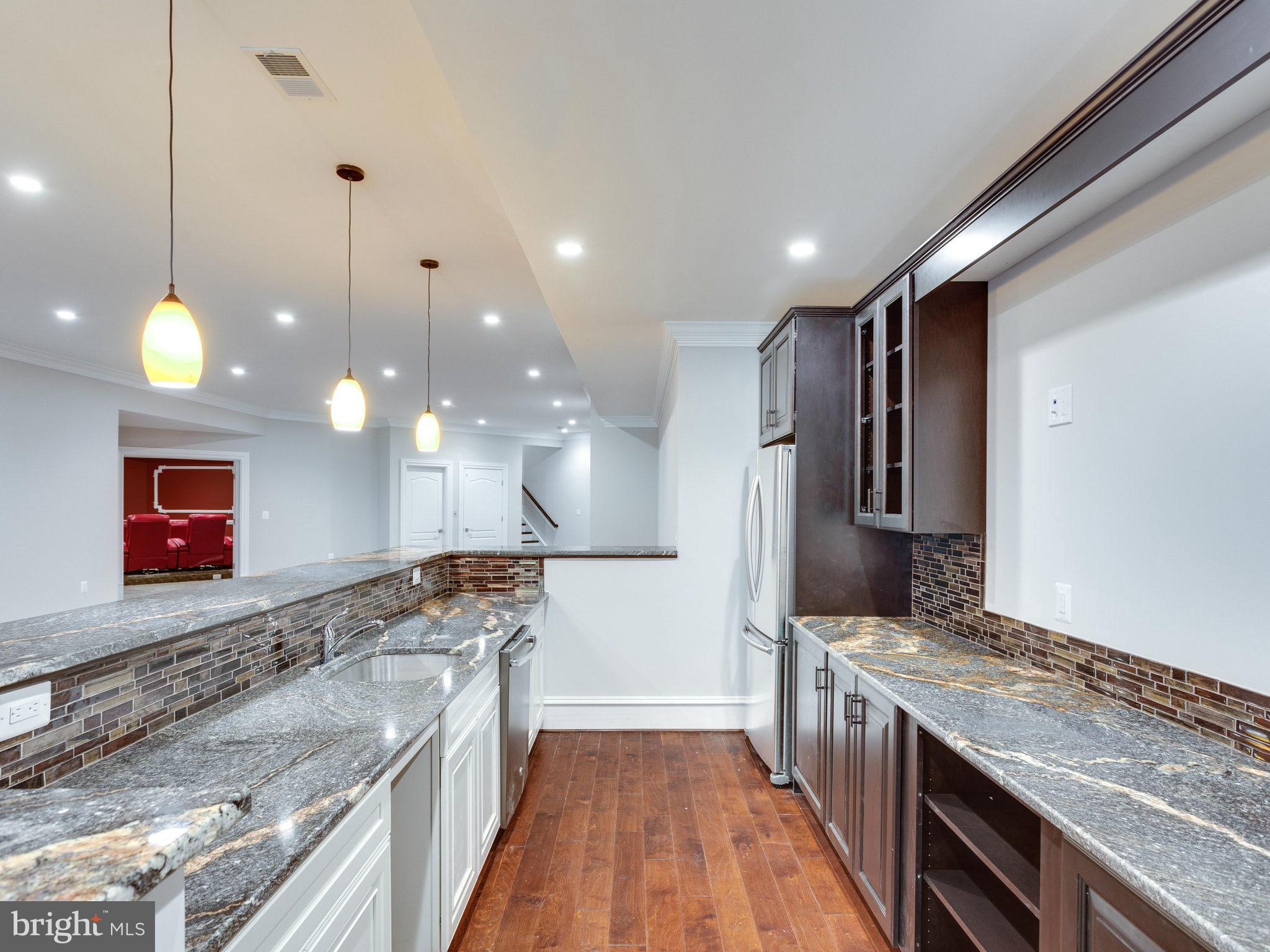 500 River Bend Road Great Falls, VA 22066 - Photo 26 of 28 Lower Level Wet Bar