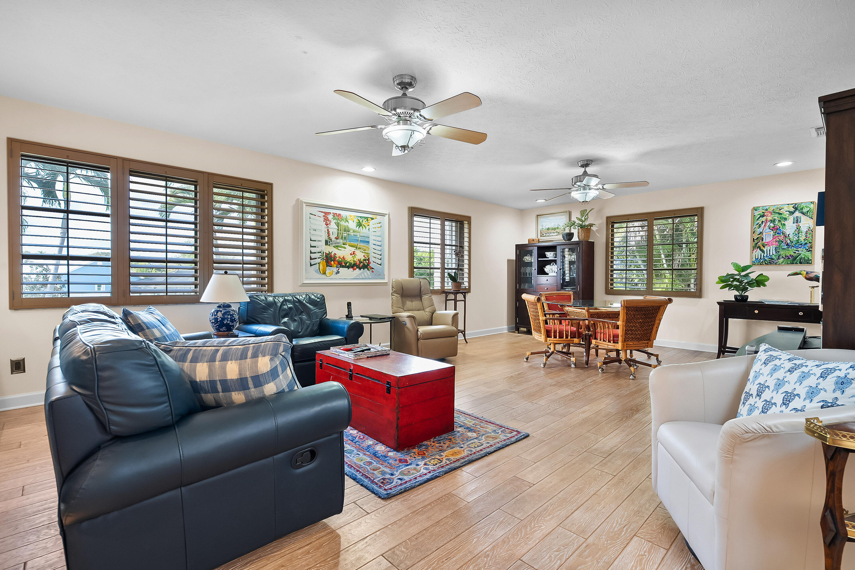 5105 Southeast Matousek Street Stuart, FL 34997 - Photo 11 of 48 a living room with furniture and a large window