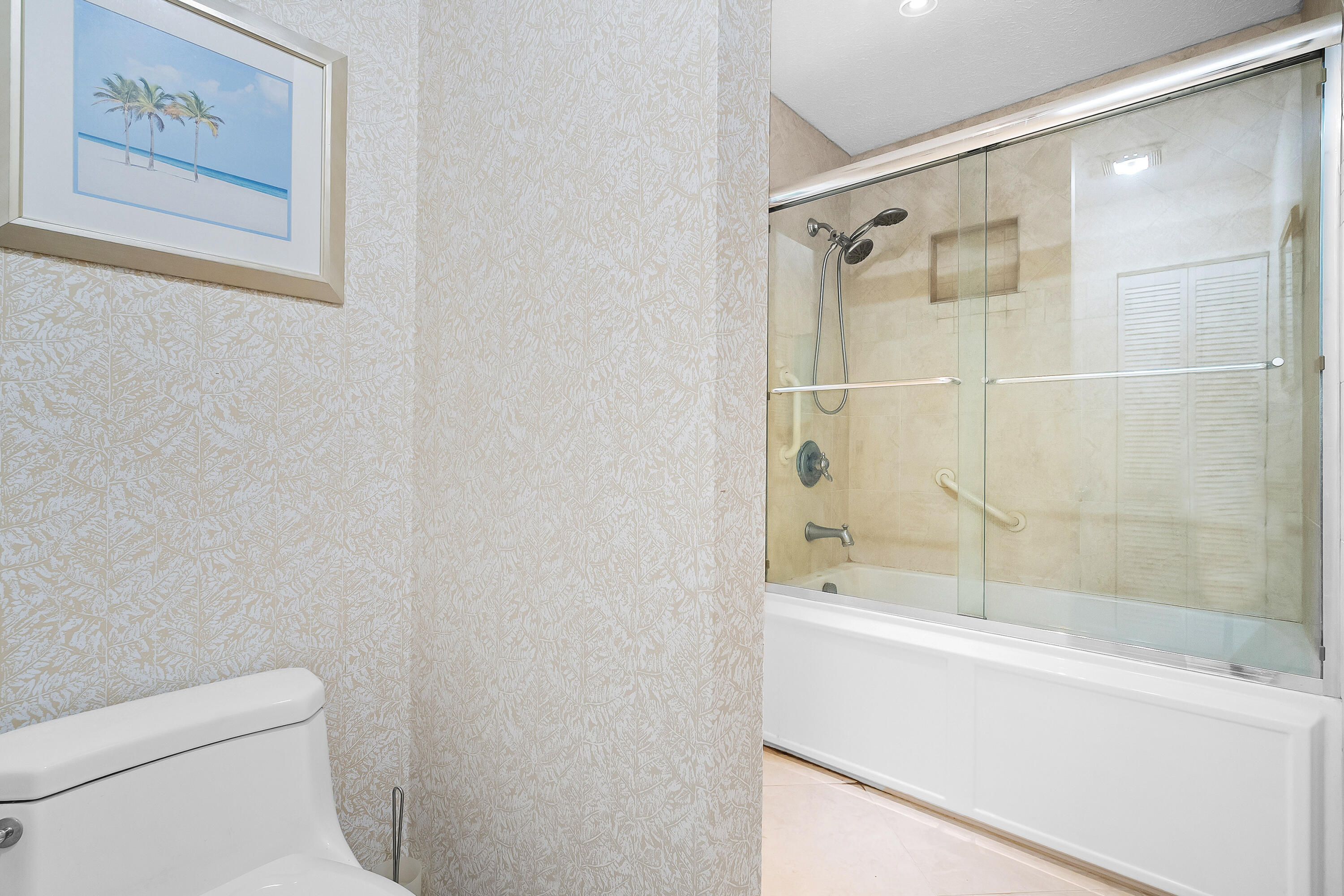 5105 Southeast Matousek Street Stuart, FL 34997 - Photo 27 of 48 a bathroom with a shower and a toilet