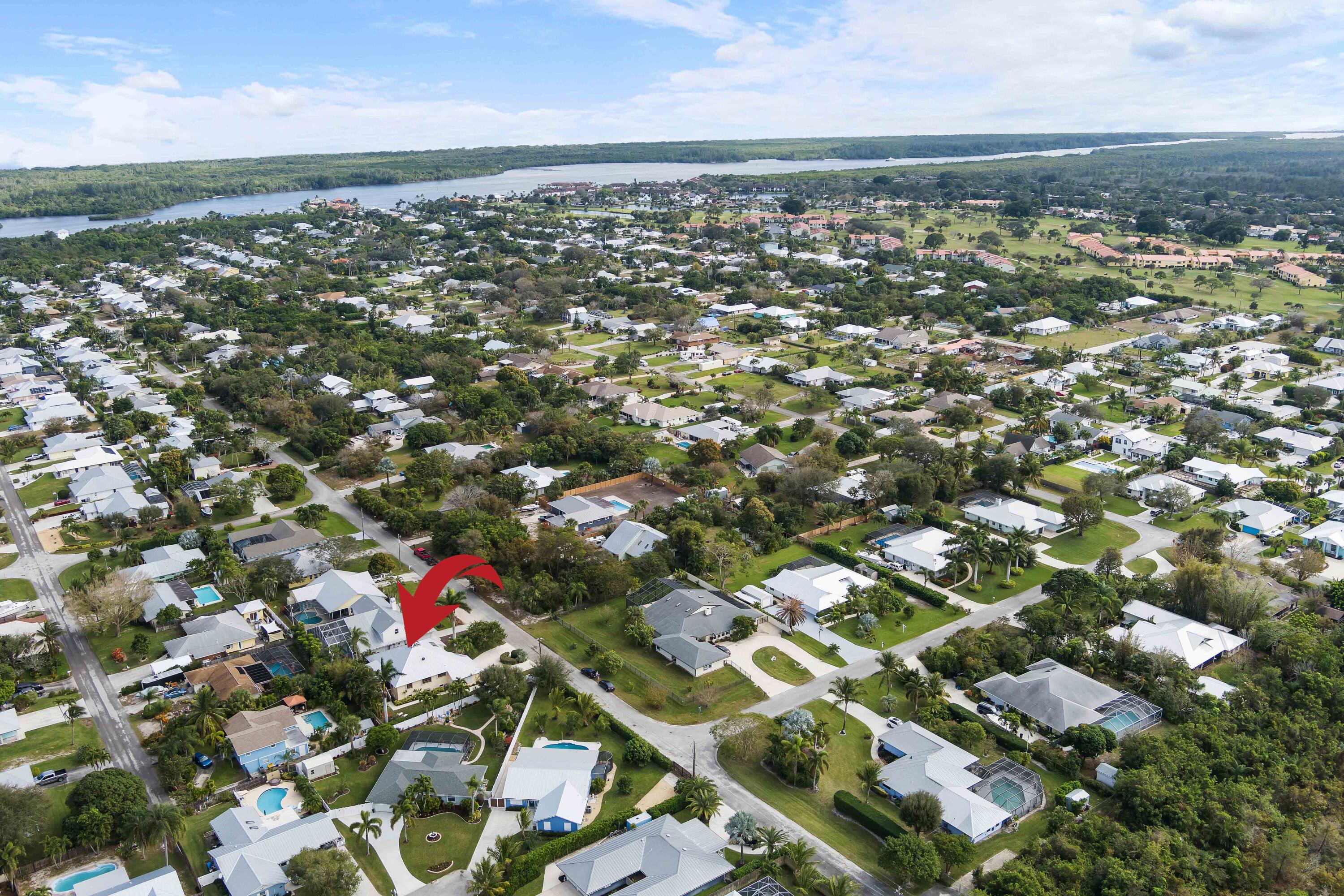 5105 Southeast Matousek Street Stuart, FL 34997 - Photo 35 of 48 an aerial view of multiple house