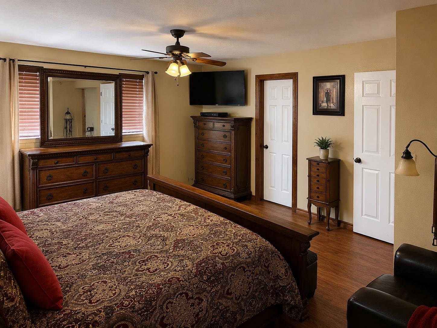 5845 Meadowview Road Beaumont, TX 77708 - Photo 14 of 24 a bedroom with a bed and a television