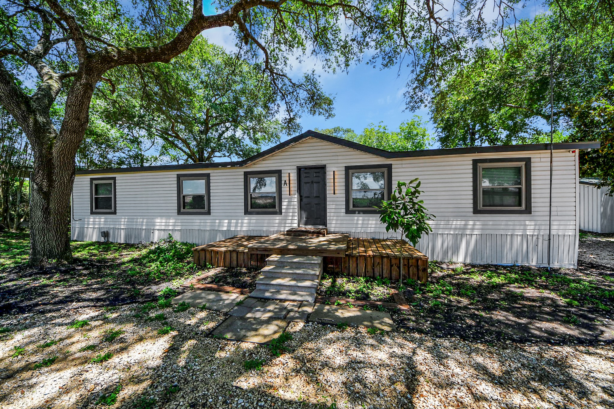 28222 Margerstadt Road Waller, TX 77484 - Photo 6 of 50 Charming country home surrounded by mature trees, open skies, and peaceful acreage.
