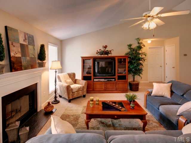 5633 Lighthall Lane Raleigh, NC 27604 - Photo 3 of 11 Another view of the family room. NEW neutral carpet and NEW neutral paint throughout!