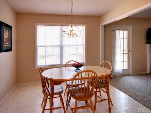 5633 Lighthall Lane Raleigh, NC 27604 - Photo 5 of 11 Light and Bright breakfast nook open to the family room.