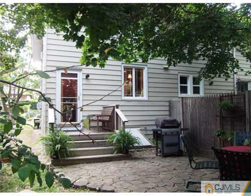 61 Jefferson Road Mercer County, NJ 08540 - Photo 13 of 15 a view of a house with a chairs in patio