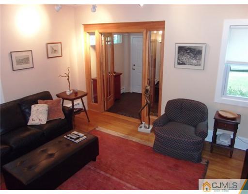 61 Jefferson Road Mercer County, NJ 08540 - Photo 6 of 15 a living room with furniture and a rug