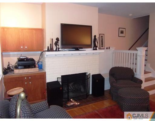 61 Jefferson Road Mercer County, NJ 08540 - Photo 7 of 15 a living room with furniture and a flat screen tv
