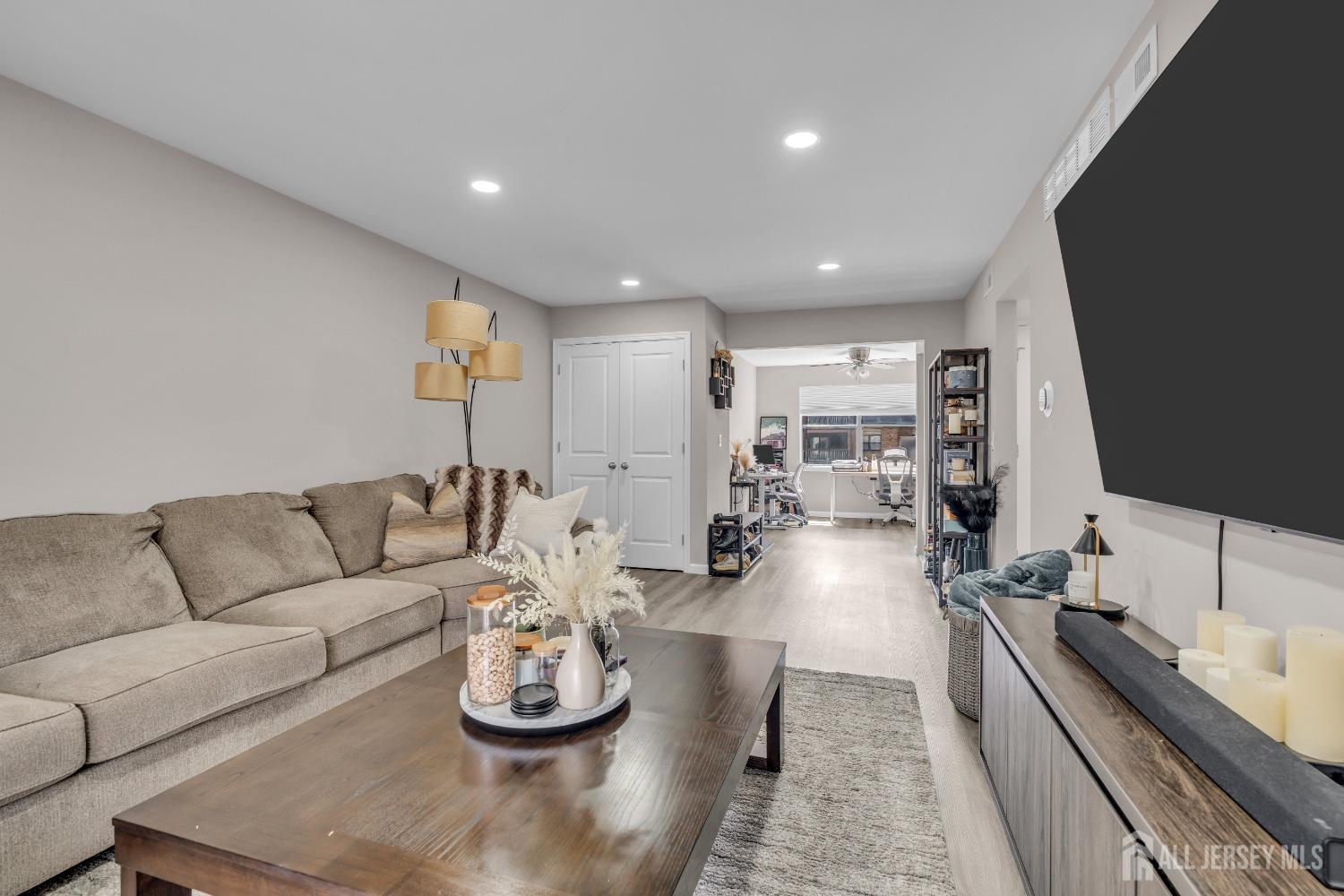1933 Raspberry Court Edison, NJ 08817 - Photo 17 of 30 a living room with furniture and a large window