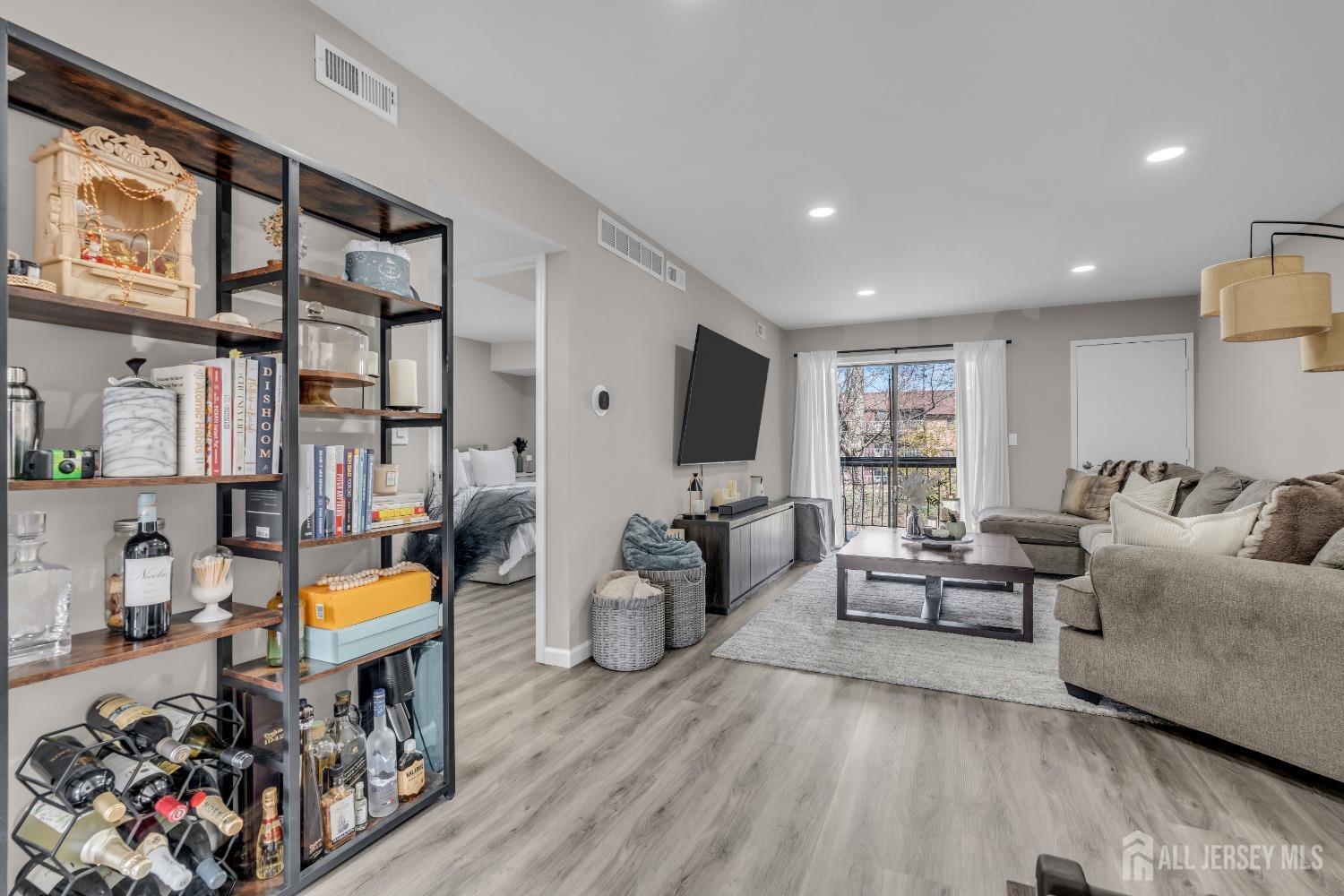 1933 Raspberry Court Edison, NJ 08817 - Photo 19 of 30 a living room with furniture and wooden floor