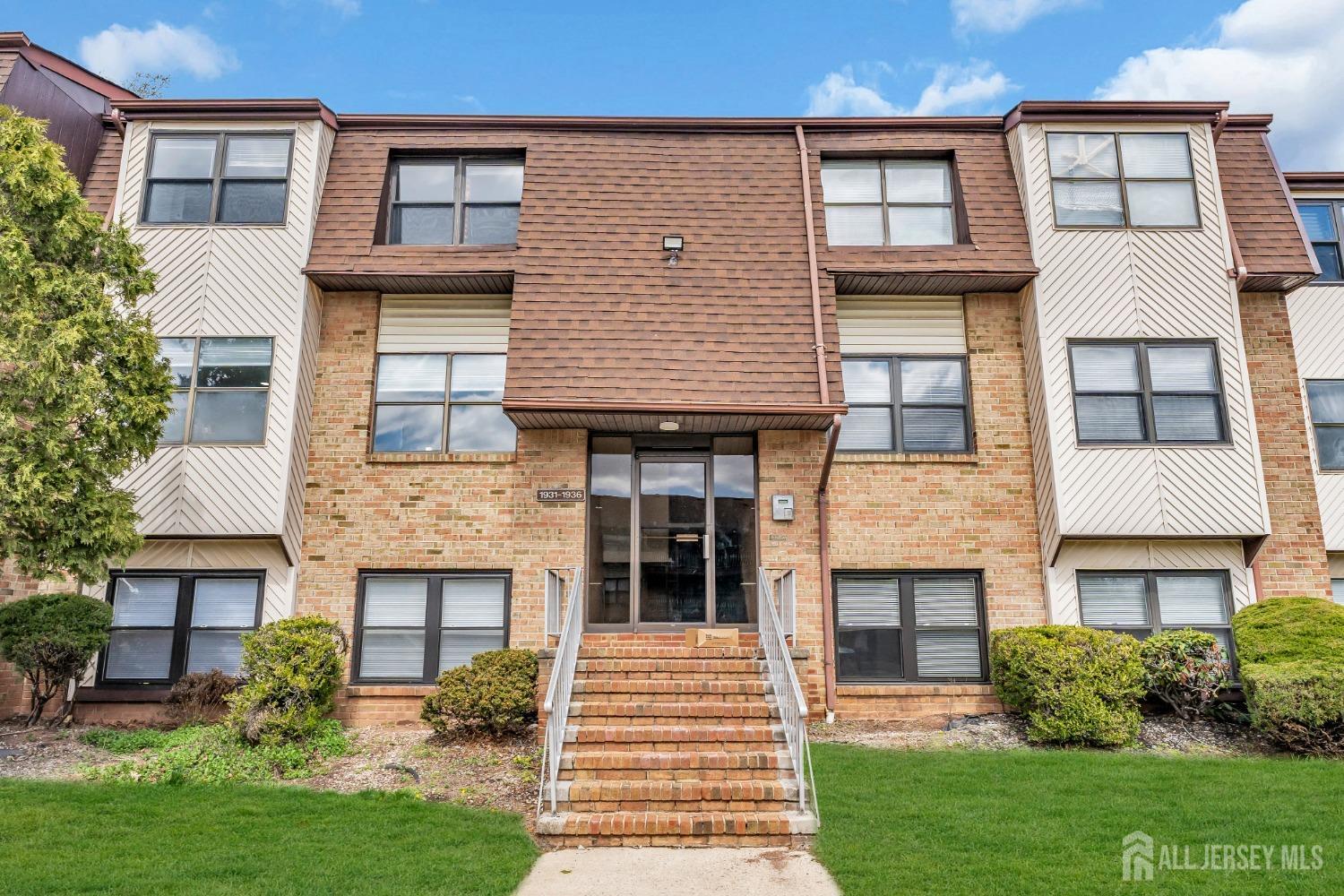 1933 Raspberry Court Edison, NJ 08817 - Photo 2 of 30 a front view of a house with garden
