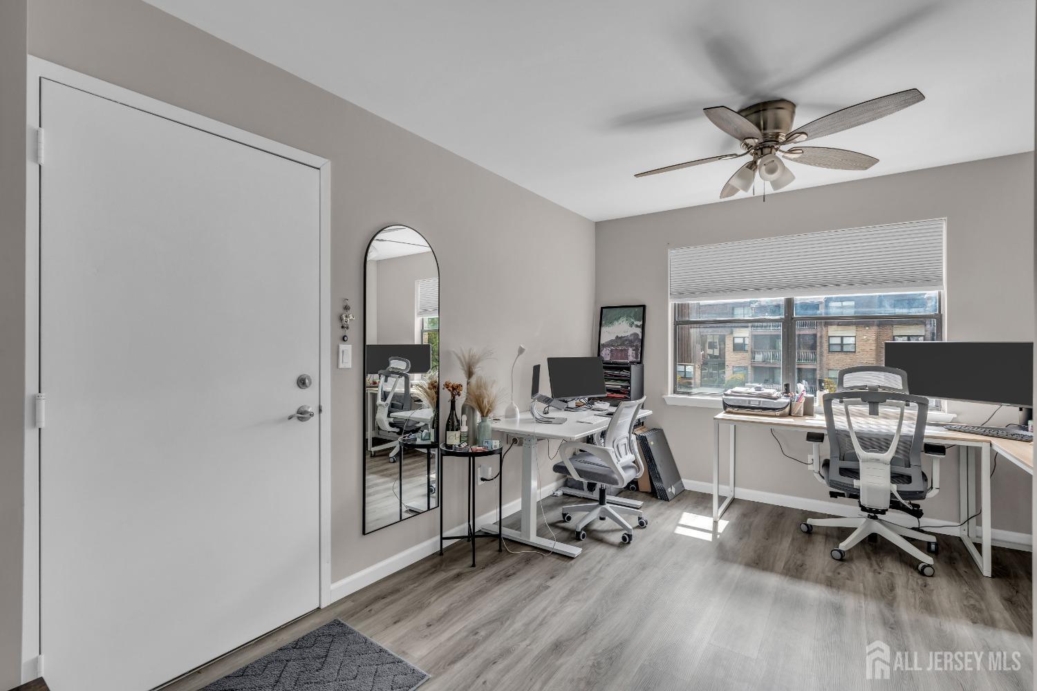 1933 Raspberry Court Edison, NJ 08817 - Photo 4 of 30 a view of a workspace with furniture and a window