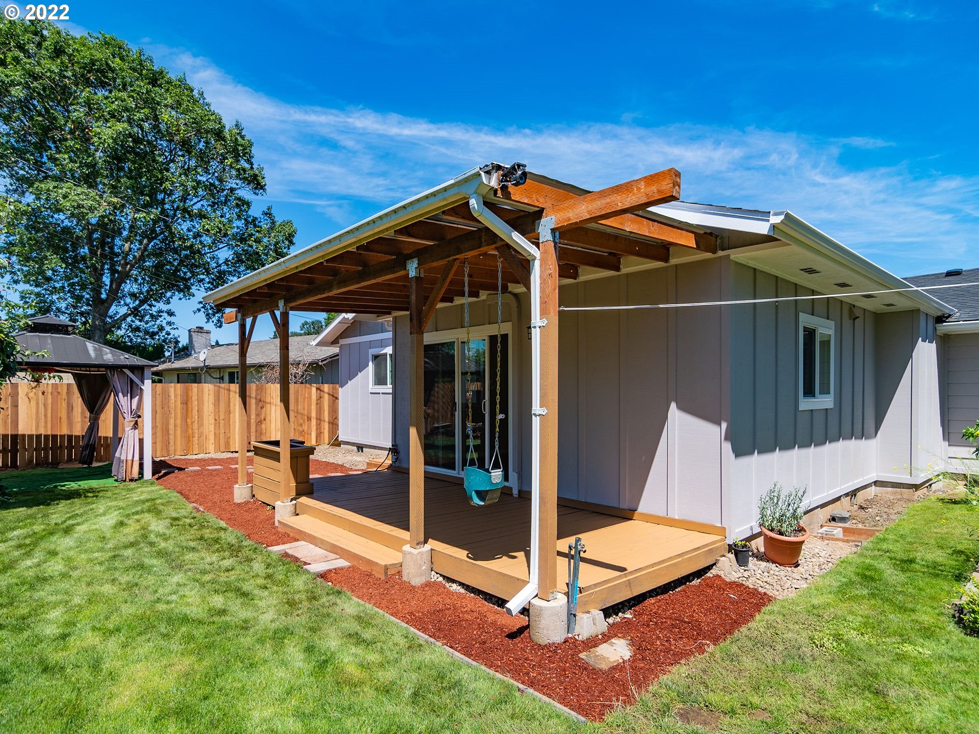 467 Mansfield Street Springfield, OR 97477 - Photo 29 of 32 a view of a house with backyard and porch