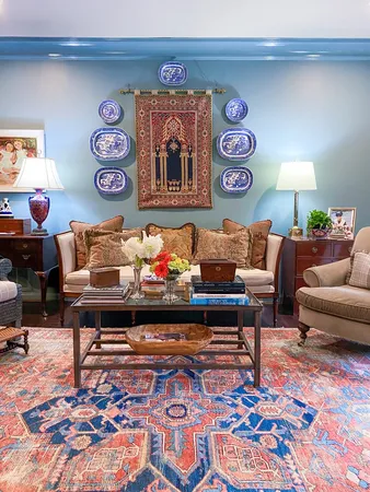 a living room with furniture and a table