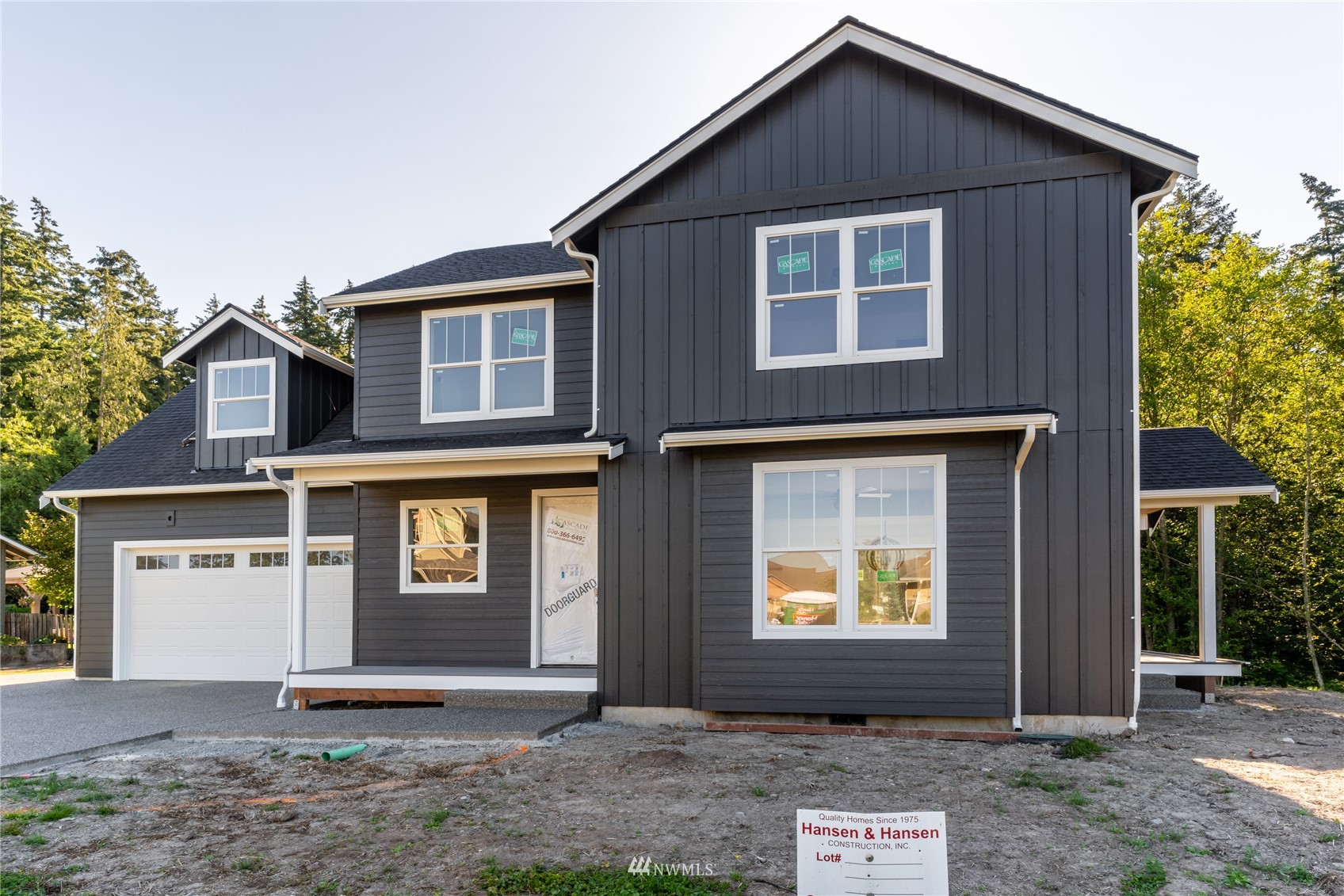 2284 South 19th Street Mount Vernon, WA 98274 - Photo 11 of 29 a front view of a house with a yard and garage