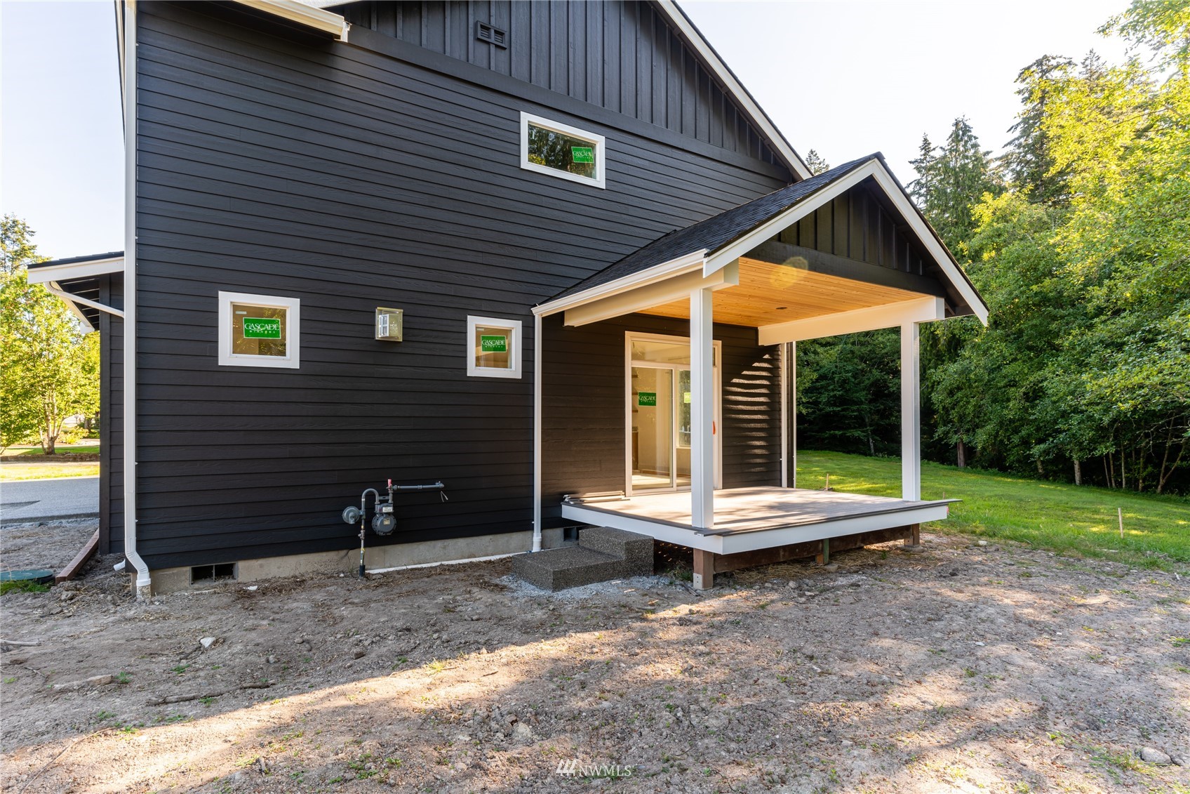 2284 South 19th Street Mount Vernon, WA 98274 - Photo 12 of 29 a view of a house with backyard and chairs