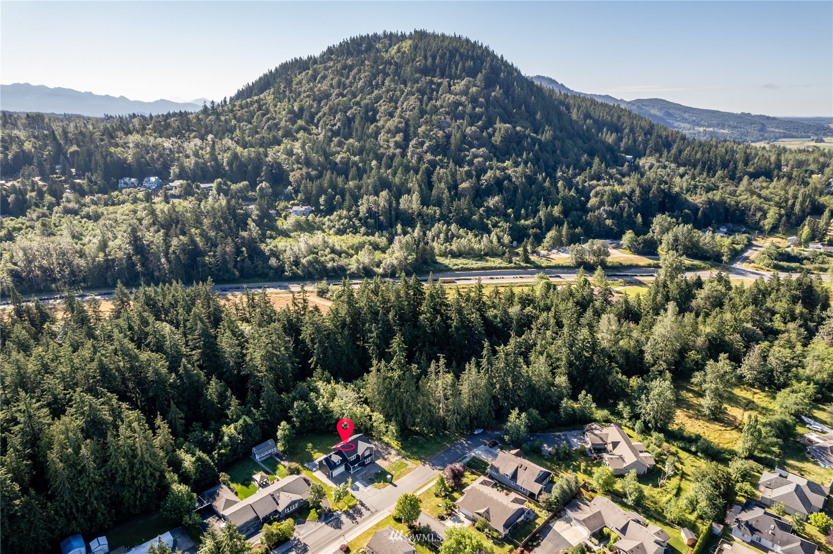 2284 South 19th Street Mount Vernon, WA 98274 - Photo 26 of 29 a view of a lake with a mountain in the background