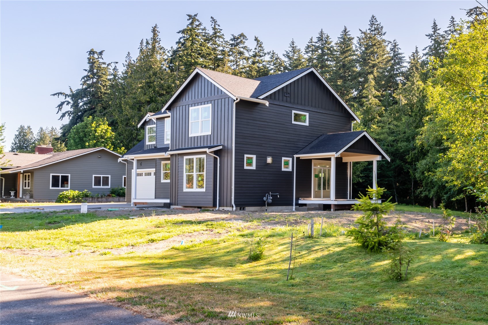 2284 South 19th Street Mount Vernon, WA 98274 - Photo 7 of 29 a view of a house with a swimming pool