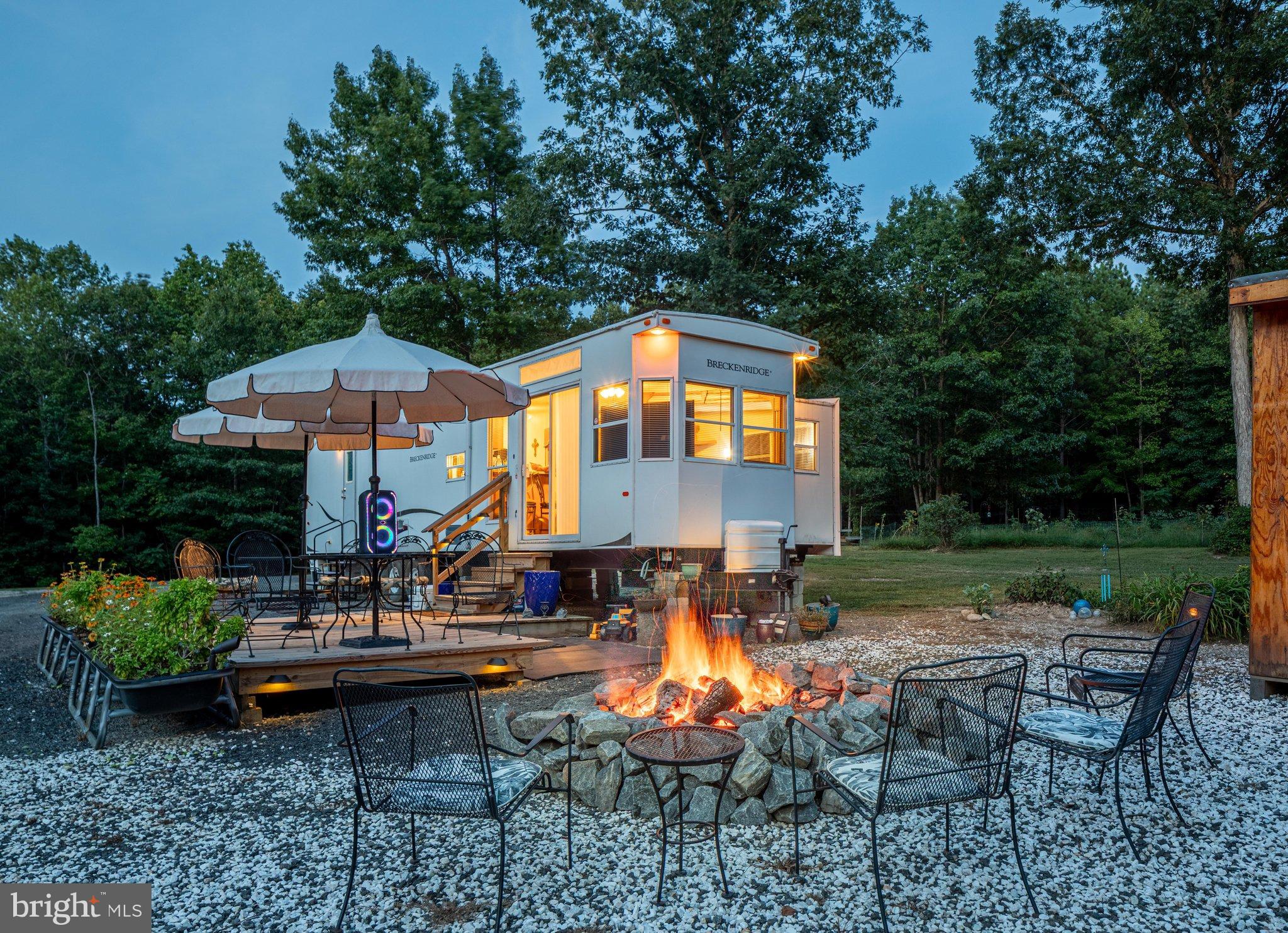 0 Flat Iron Road Montross, VA 22520 - Photo 109 of 116 Cozy retreat with fire pit under twilight skies.