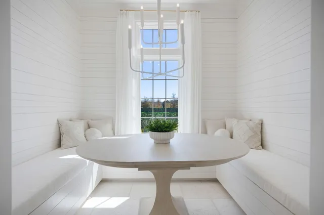 a view of an empty room with a fireplace