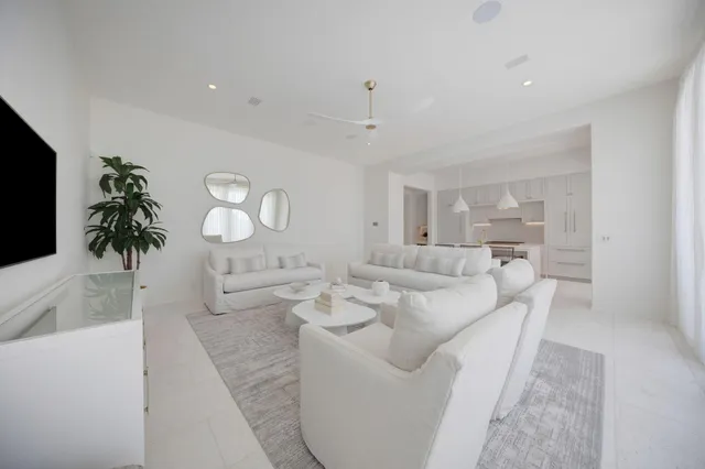 a bedroom with a bed and a night stand