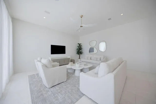 a bathroom with 2 sink tub and a mirror