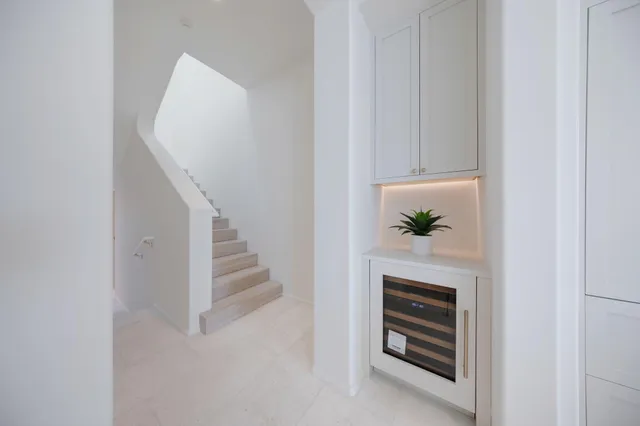 a bathroom with 2 sink and a mirror