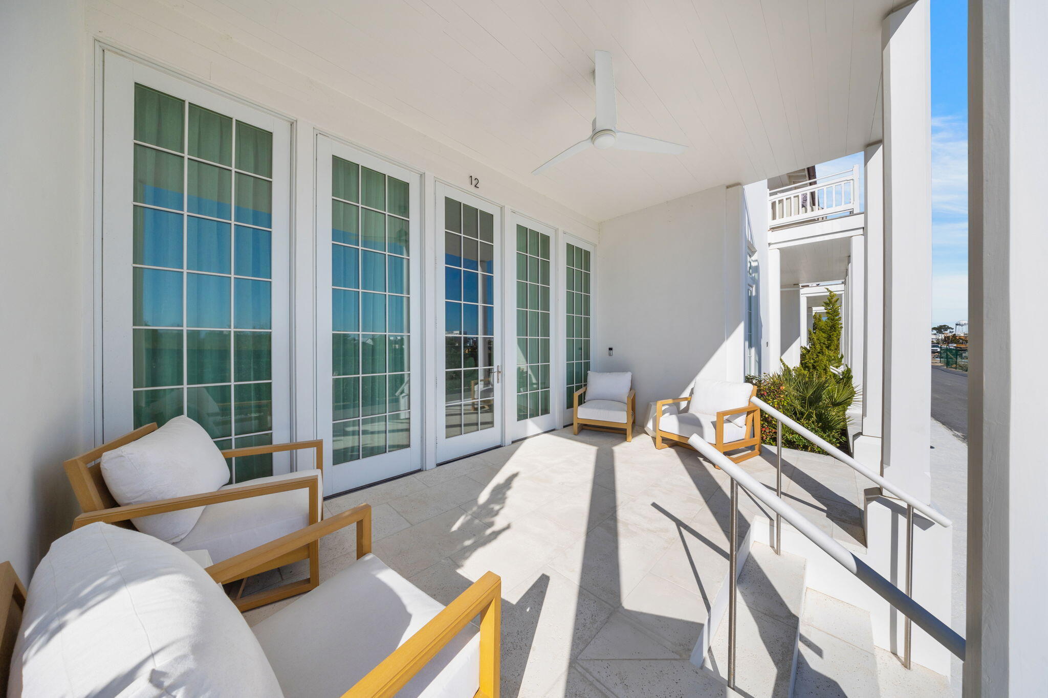 19 Astra Way Inlet Beach, Unit M12 Inlet Beach, FL 32461 - Photo 2 of 81 a living room with furniture fireplace and a large window